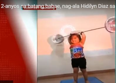 2 year-old girl lifts weight